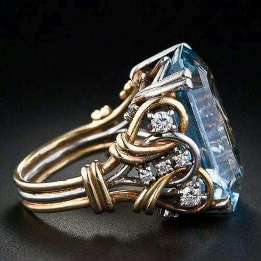 Anello vintage in oro con zirconi blu a strati