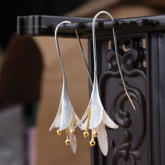 Orecchini a forma di fiore in argento 