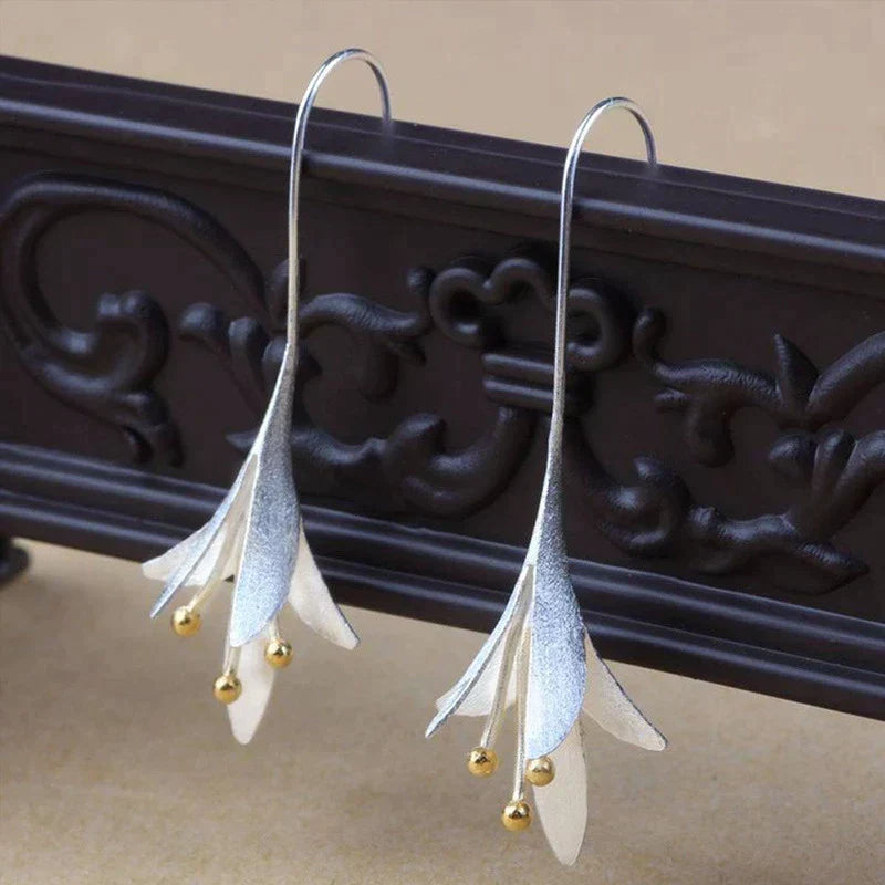 Orecchini a forma di fiore in argento 