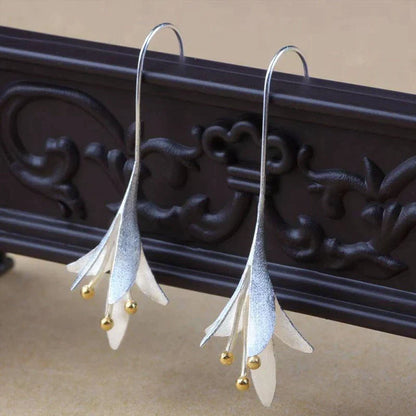 Orecchini a forma di fiore in argento 