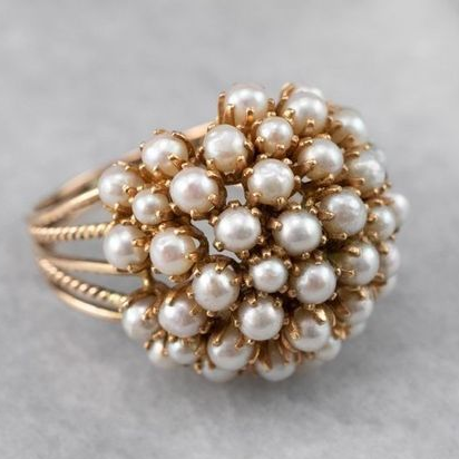Anello con perle intarsiate 